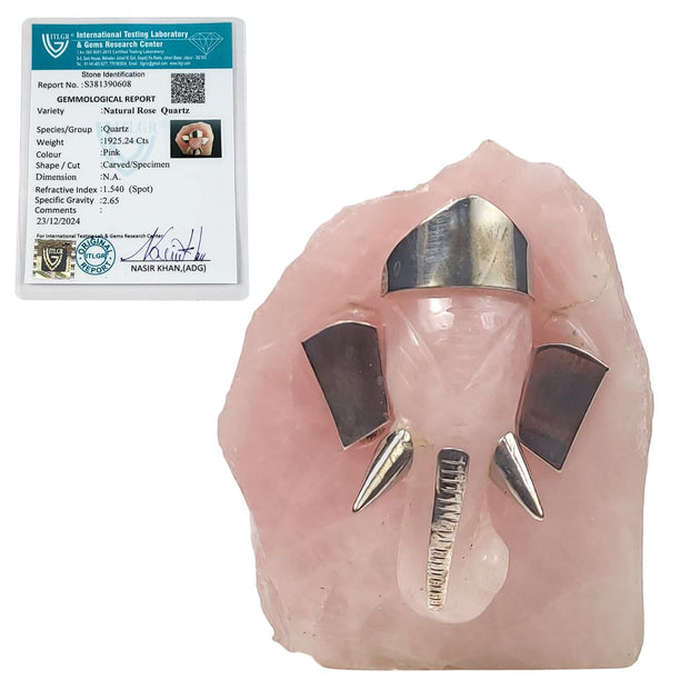 Pink crystal with metal spikes and a certification card on a white background