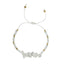 moonstone thread bracelet with white stones and gold beads on a white background