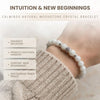 Calming bracelet with text on intuition and new beginnings, worn by a person.