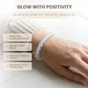 Opalite crystal bracelet on a wrist with text highlighting benefits on a light background