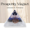 Orgonite pyramid labeled 'Prosperity Magnet' on a neutral background