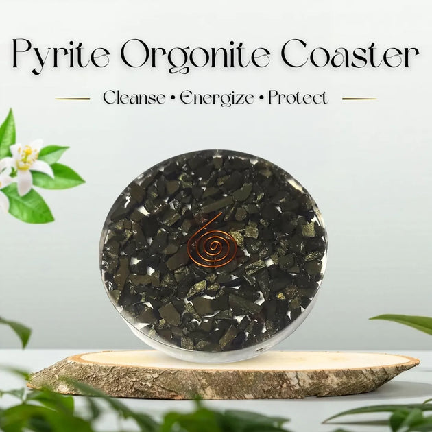 Pyrite Orgonite Coaster with text 'Cleanse, Energize, Protect' on a light background with greenery.