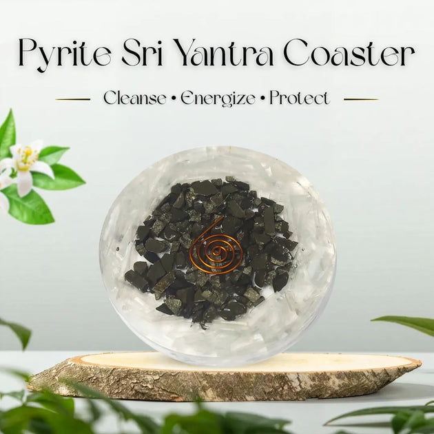 Pyrite Sri Yantra Coaster with text 'Cleanse, Energize, Protect' on a light background with greenery.