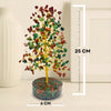 Decorative gemstone tree with measurements on a neutral background