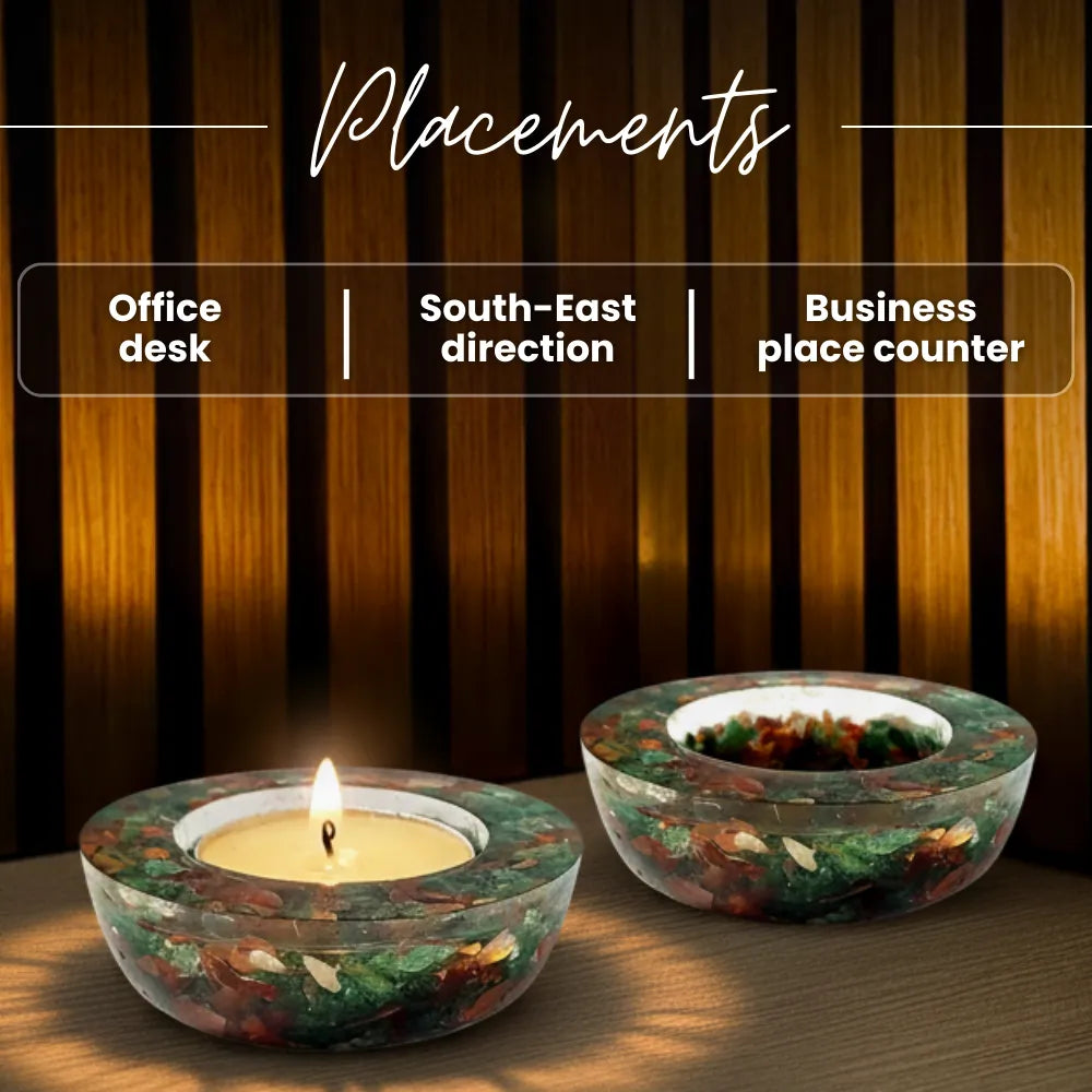 Two decorative candles in glass holders on a wooden surface with text indicating placements.