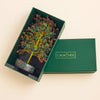 Green box with a tree sculpture and 'Calminds' logo on a beige background