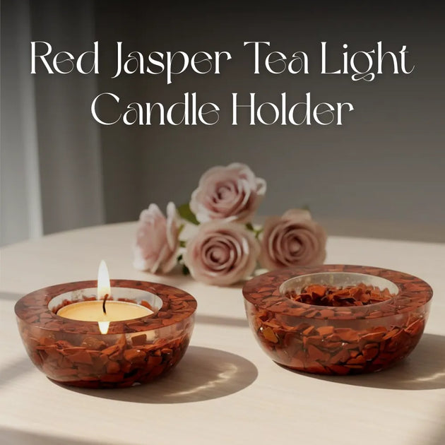 Red Jasper tea light candle holder with a lit candle and rose petals on a neutral background.