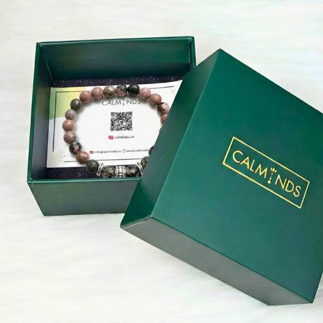 Bracelet in a 'Calm Minds' box on a white background