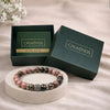 Calminds Rhodonite Healing Bracelet close-up showing pink and black beads