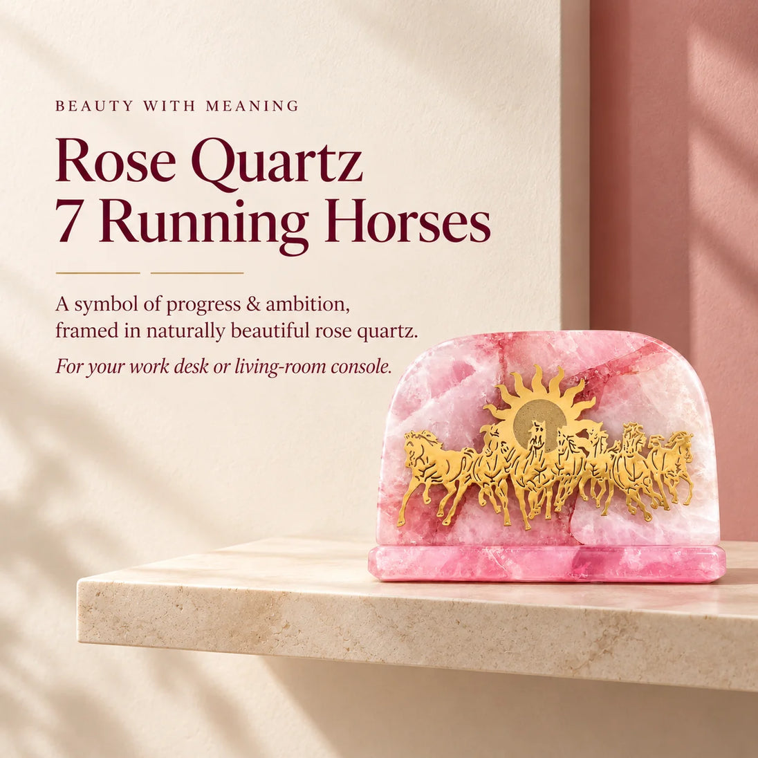 Pink rose quartz showpiece with seven golden running horses and a sun