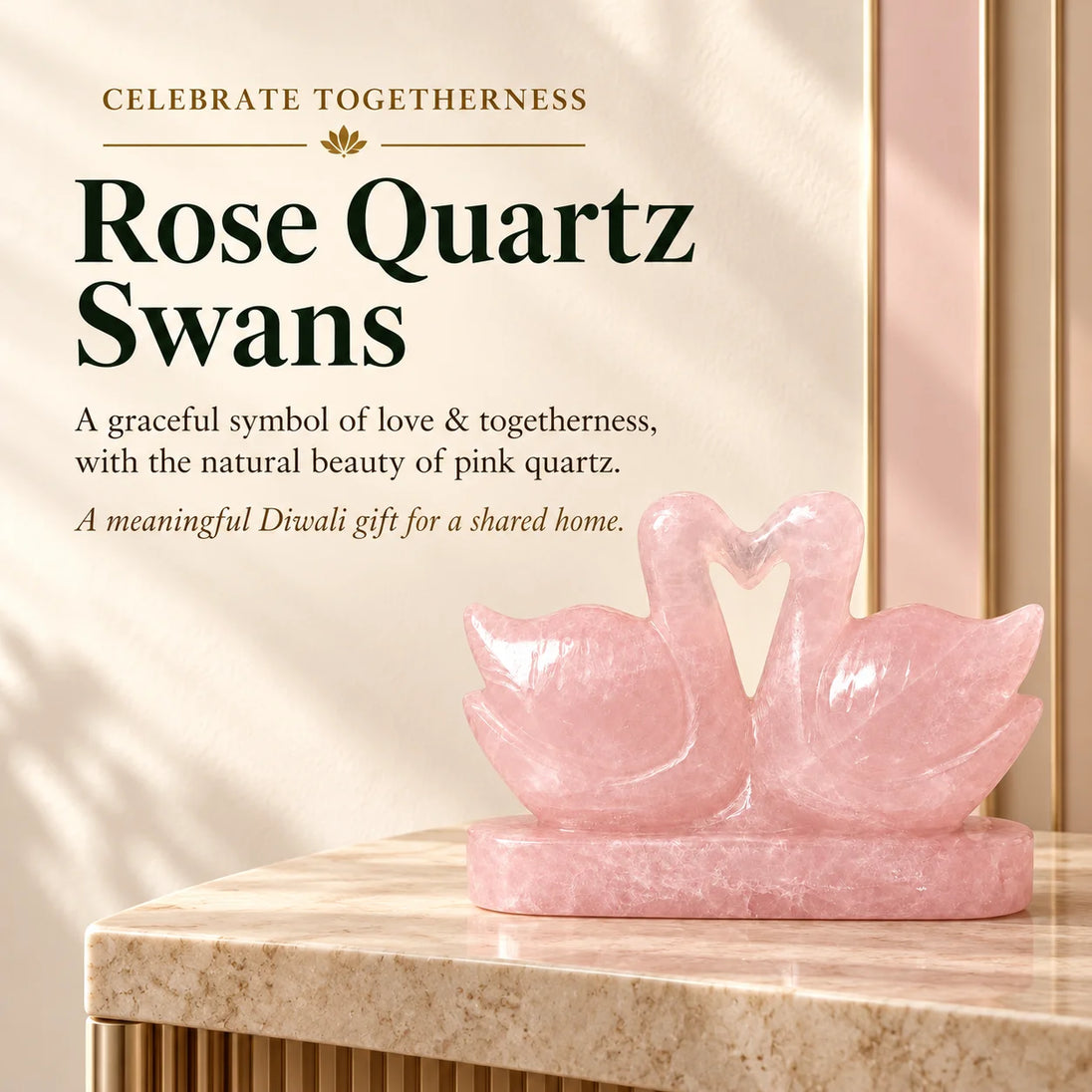 Pair of pink rose quartz birds with necks curved to form a heart