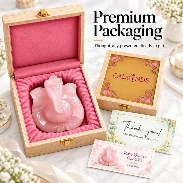 Rose Quartz Ganesha idol in a pink lined Calminds presentation box