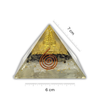 Triangular crystal pyramid with a spiral and temple-like structure, size indicated by measurement scale.
