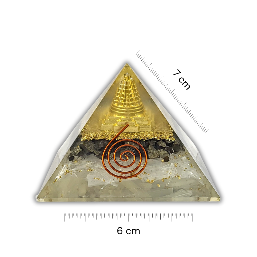 Triangular crystal pyramid with a spiral and temple-like structure, size indicated by measurement scale.