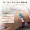 Crystal bracelet with beads on a wrist, labeled 'Self-Love and Compassion' by Calminds.