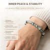 Tree agate crystal bracelet on a wrist with text about its benefits on a light background