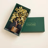 Green box with a decorative plant inside on a beige background, featuring the brand 'CALM NDS'.